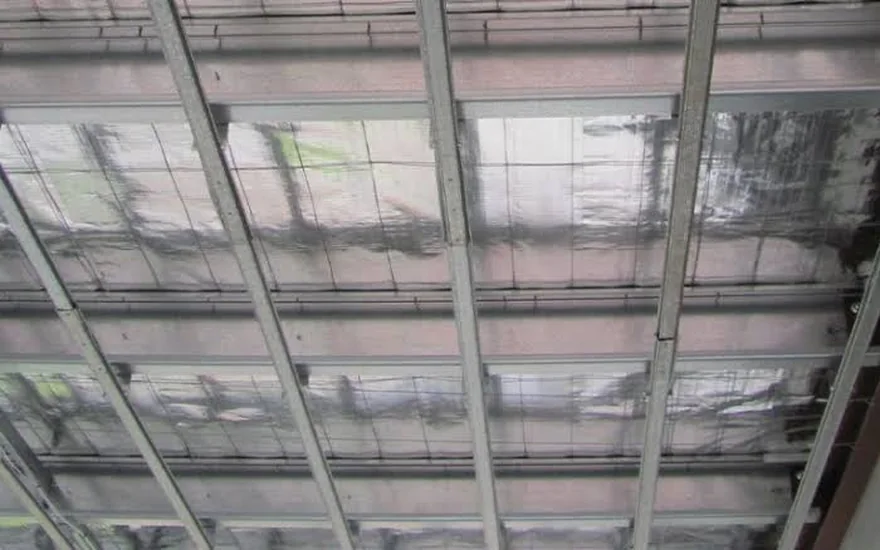 Ceiling battens and framing exposed during a ceiling repair