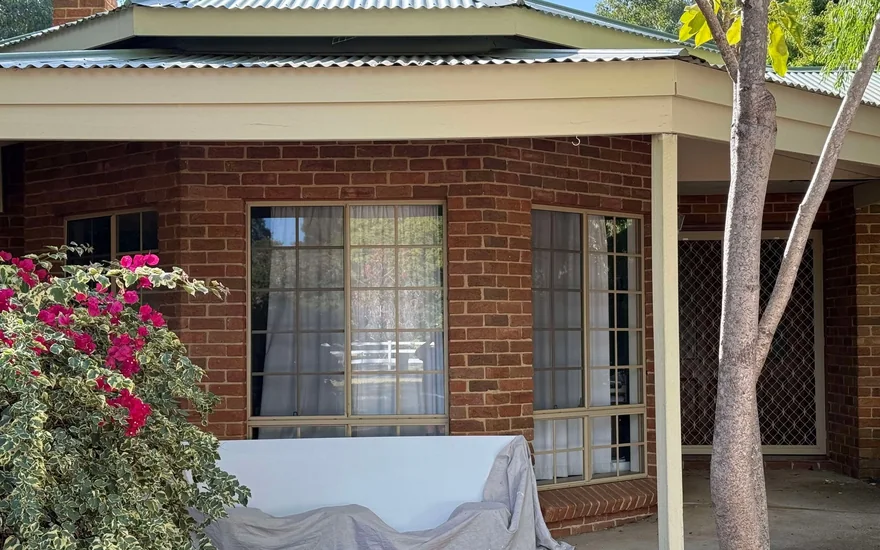 Finished patio and verandah roof on a brick home