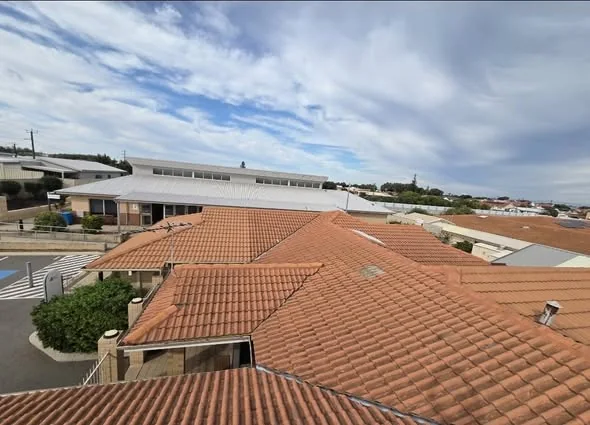 Village administration buildings with restored roofing