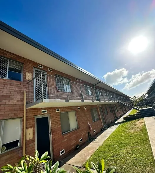 Unit block with newly installed fascia, gutters and eaves