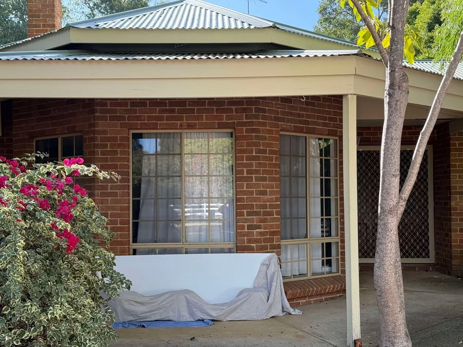 Completed patio roof and verandah on a brick home